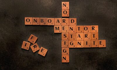 a scrabble of words that say no on board, mentor, start,